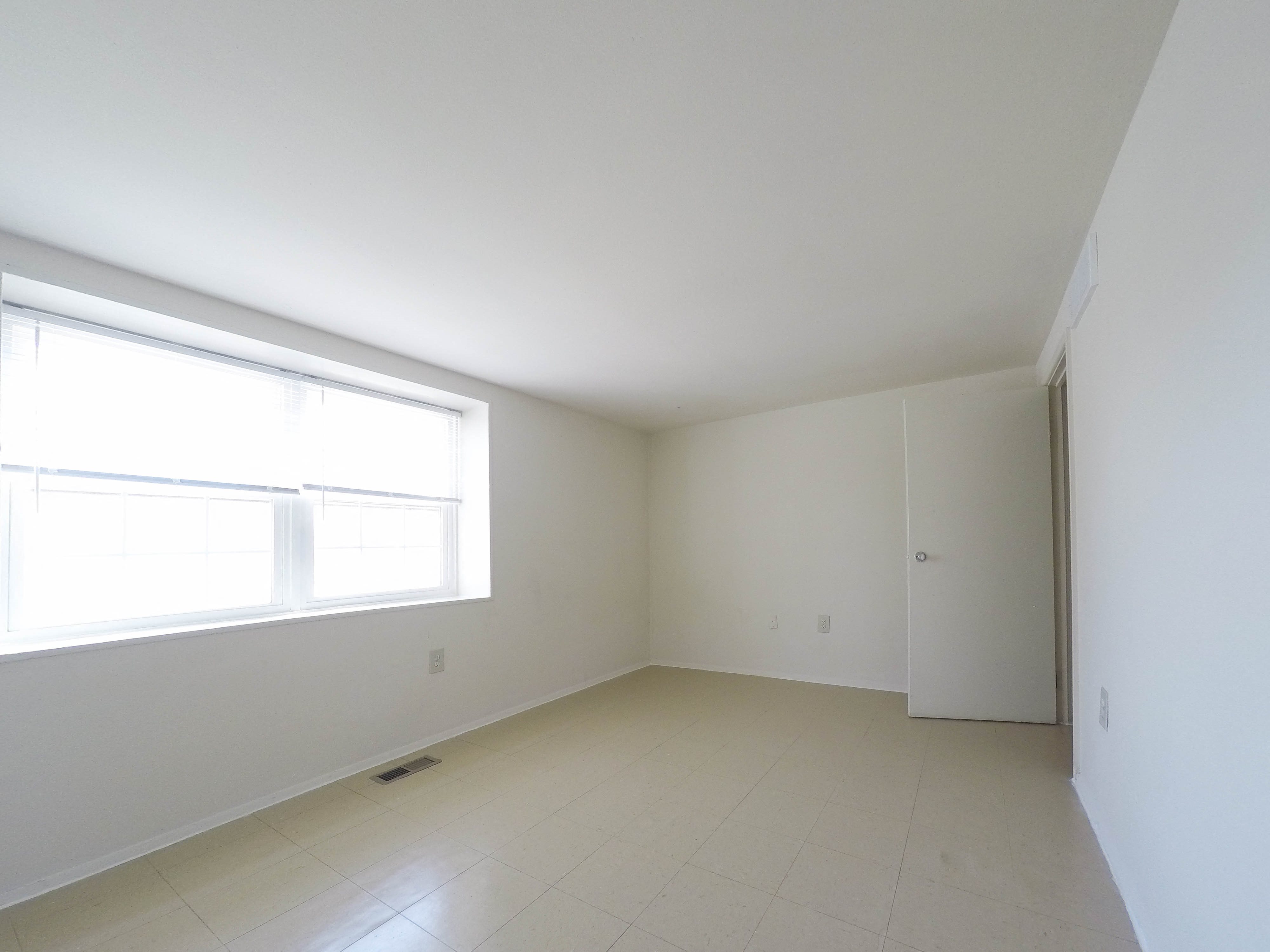 large bedroom with window